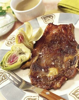 CHULETAS EN SALSA DE NARANJA CON ALCACHOFAS