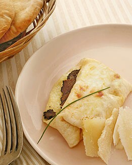REVUELTO DE MOZZARELLA, TRUFA Y PARMESANO 